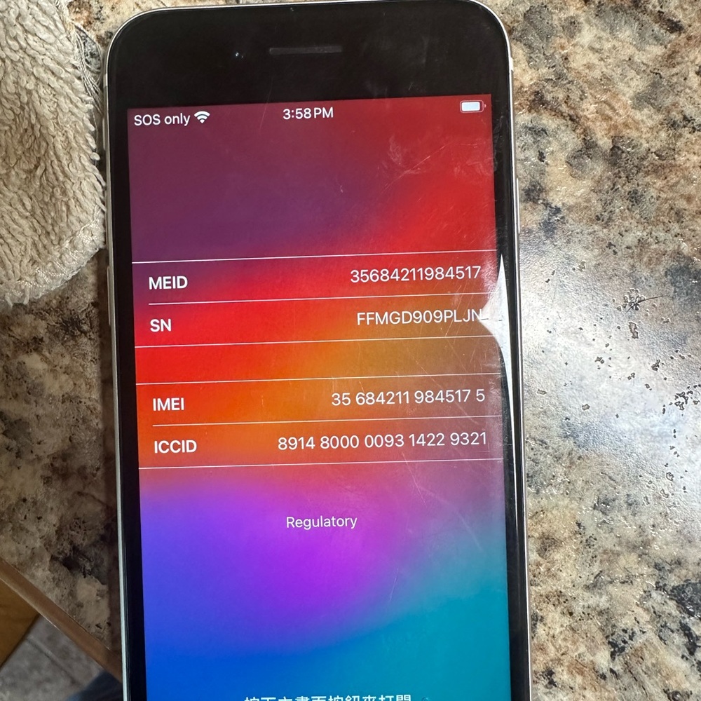 IPhone SE 64 GB through straighttalk back screen cracked but works great